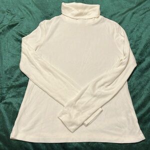 White Uniqlo fleece turtleneck sweater
